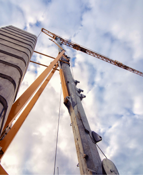https://alfiras.com/wp-content/uploads/2024/09/bottom-view-tower-crane-against-cloudy-sky.jpg